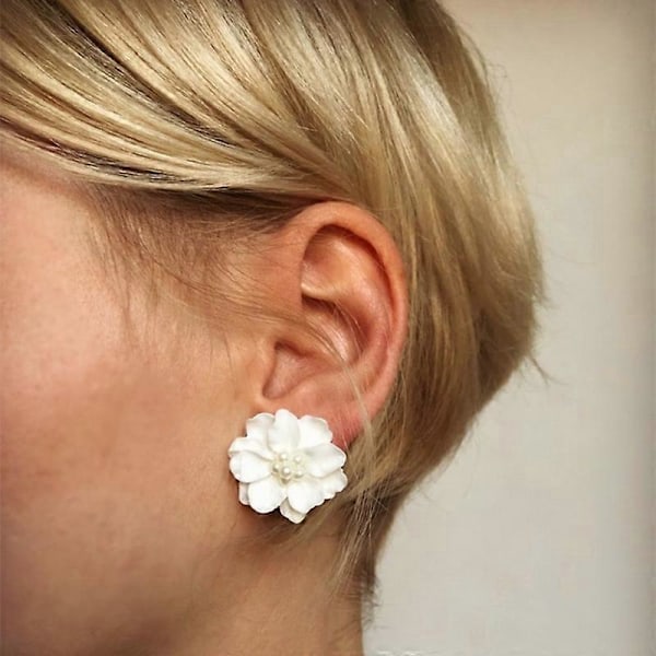 Elegantit hartsikukkakorvakorut treffeille ja juhliin