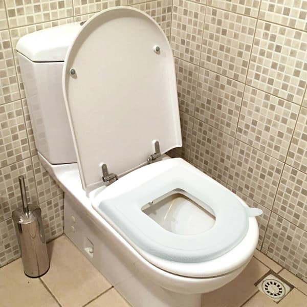 Vedenpitävä itsekiinnittyvä WC-istuimen pehmuste