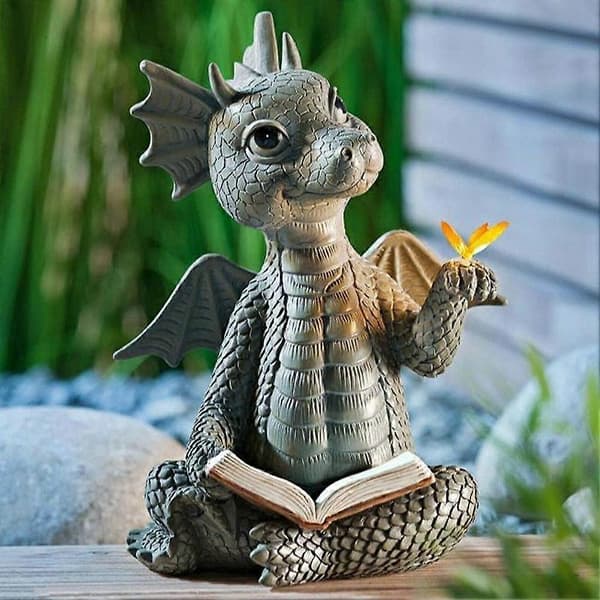 Drage som leser bok-statue Dinosaur som holder sommerfugl-figurer A