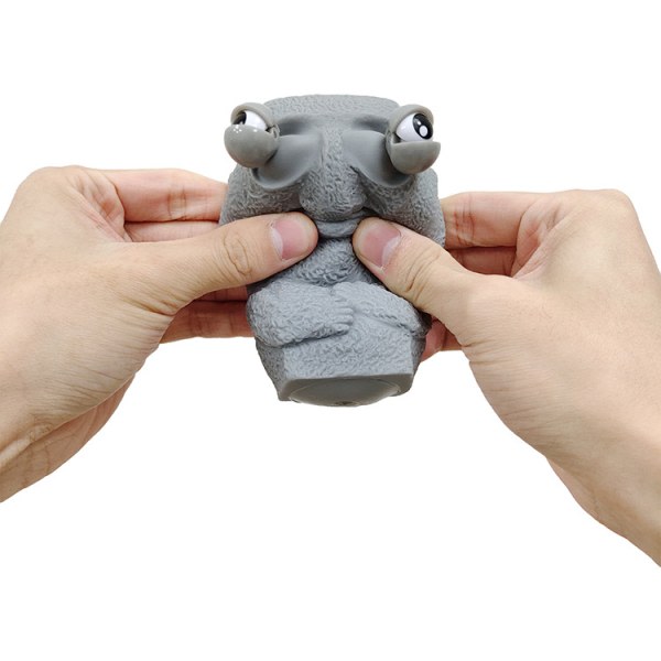 Klämande leksaker med pop-out ögon Mini Rock Man Stress relief för barn tonåringar (gul)