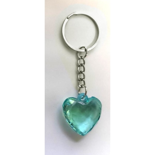 Nyckelring med ett turkos transparent hjärta / hjärtformad Tu
