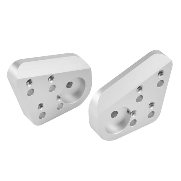 2 moottoripyörän lisävarustetta, ohjaustangon korotin