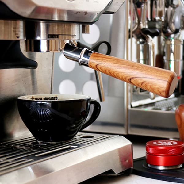 54 mm:n espressokoneen portafilter-kori