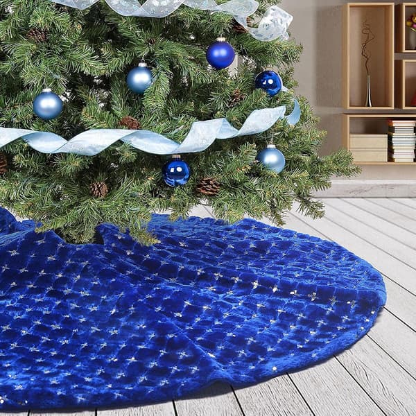 Sininen tekoturkis joulukuusen alusmatto