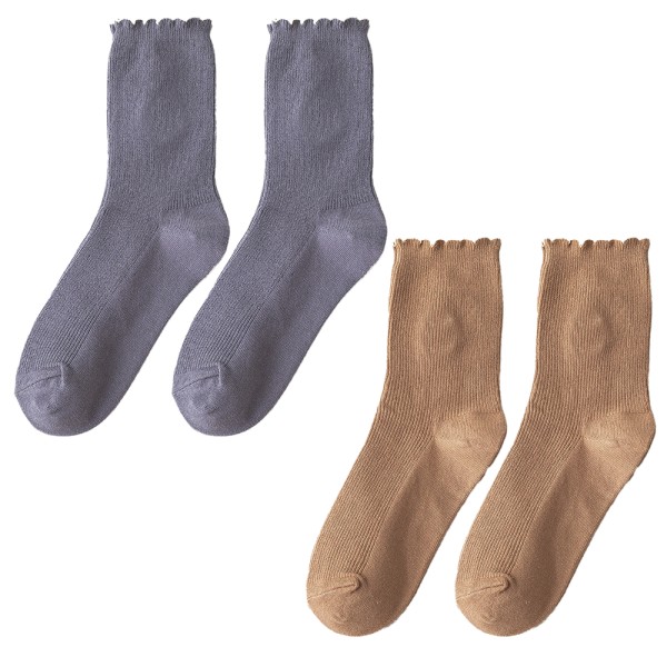 Myke runde sokker med blomsterbrodert tåledd