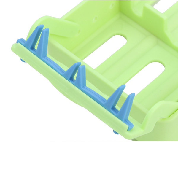 Steriliseringsställ för tandläkarinstrument i plast, plats för instrument, desinfektionslåda (grön)