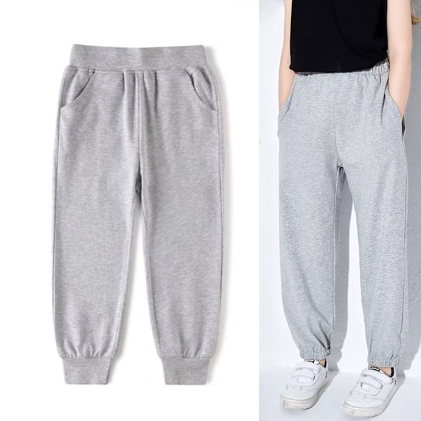 Barn Mjukisbyxor Elastisk Midja Andningsbara Trendiga Avsmalnande Bomulls Joggingbyxor för 120cm till 130cm Pojkar Flickor Grå