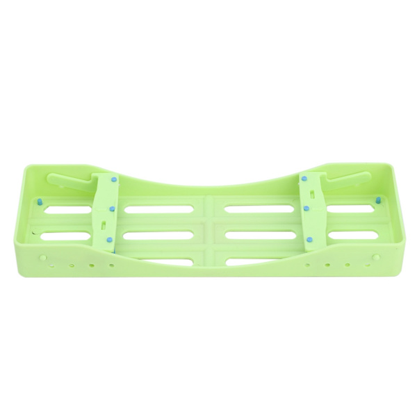 Steriliseringsställ för tandläkarinstrument i plast, plats för instrument, desinfektionslåda (grön)
