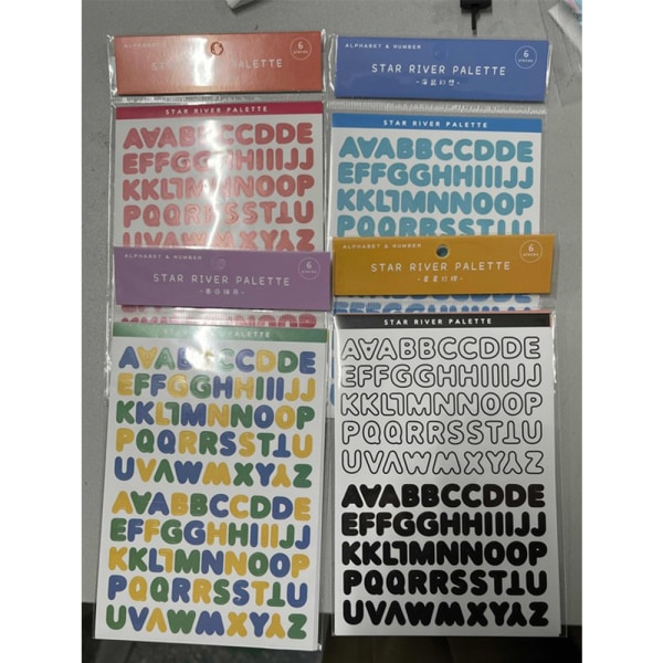 24 ark med forskellige farver bogstaver og digitale klistermærker