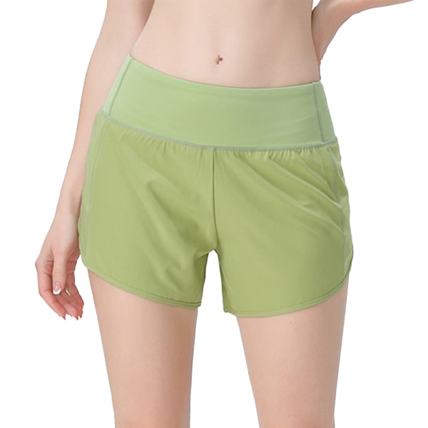 Korkeavyötäröiset fitness shortsit, joissa taskut imevät hikeä