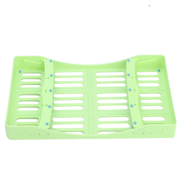 Steriliseringsställ för tandläkarinstrument i plast, plats för instrument, desinfektionslåda (grön)
