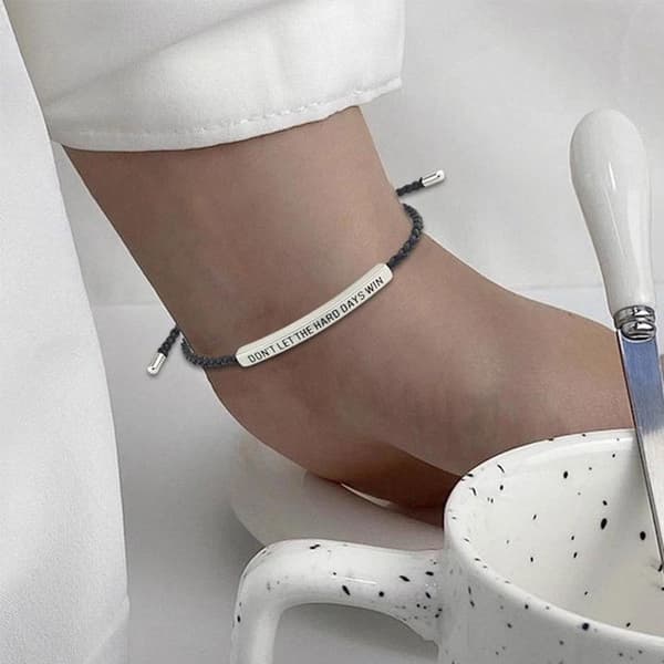 Armbånd \"Lad ikke de hårde dage vinde\" til kvinder og mænd Sort onesize