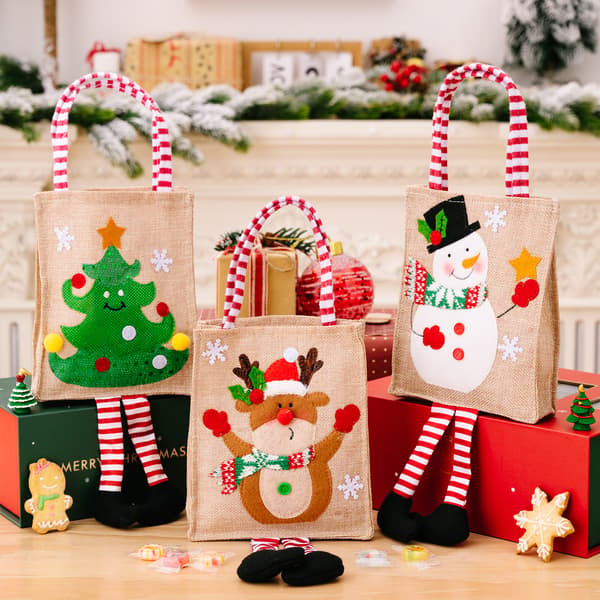 #4 stycken tecknade randiga julklappspåsar#