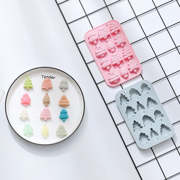 #2-pack med bakformar för kakor i olika julgransformer#