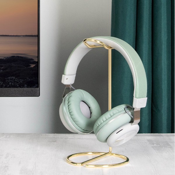 #Hodetelefonstativ i gullfarge med metallbase#