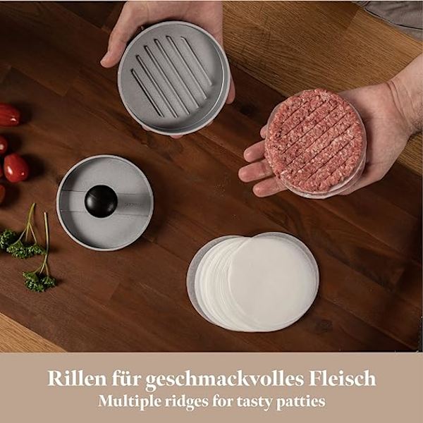 En sort håndtagsmodel (farveboks) manuel non-stick hamburgerpresse