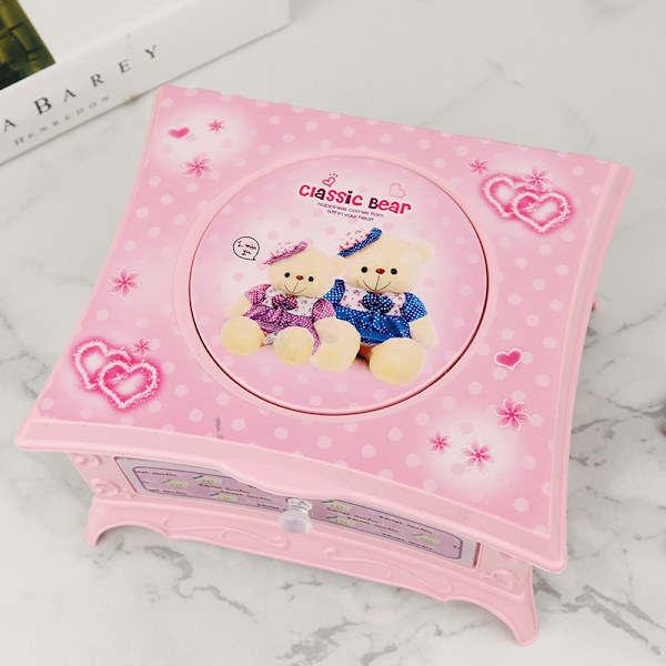 Sød og sød prinsesse pink flip smykke musikboks, der snurrer og