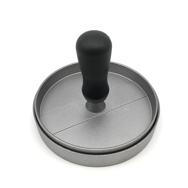 En manuell hamburgerform i svart med håndtak (fargeboks) med non-stick belegg