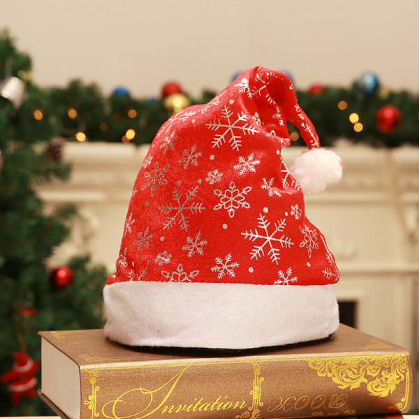 #10 - Pakkauksessa pehmoiset joulupukin hatut, hopeanväriset joulupukin hatut#