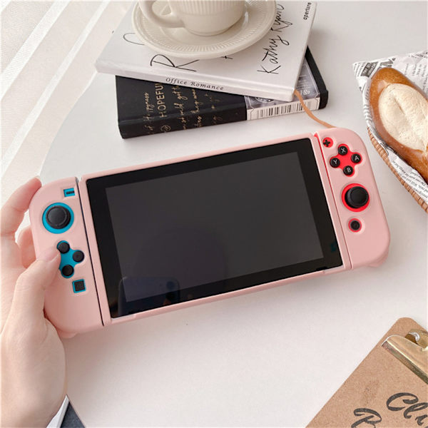 Nintendo Switchille Pure Color iskunkestävä TPU-kotelo (Vaaleanpunainen)