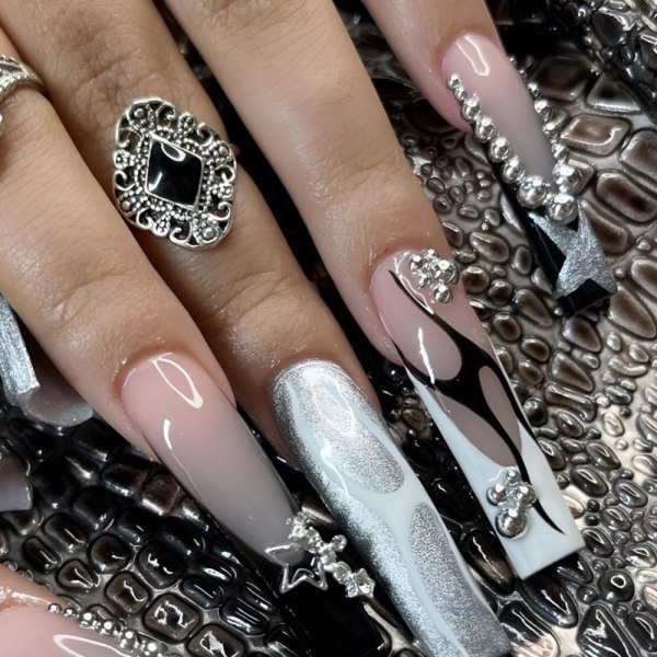 24 st Press on Nails Långa fyrkantiga falska naglar Svarta franska lösnageltips med stjärndesign Söt konstgjord nagelsats i akryl Långt svart lim på naglar