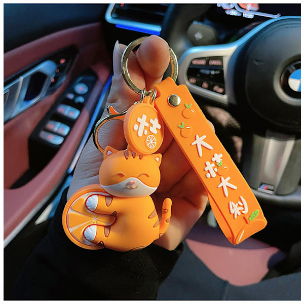Intressant hjälp att slappna av Lycklig lycklig ingefära katt orange kattunge nyckelring nyckelring nyckelring nyckelring - Katt som håller en orange