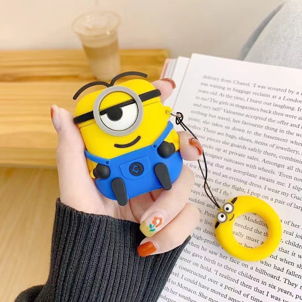 Ihmiset, joilla on isot silmät ja yksi silmänsininen sarjakuva-kuulokkeiden kotelo, Airpods pro2 langattomat Bluetooth-kuulokkeiden kotelo ja silikonikotelo.