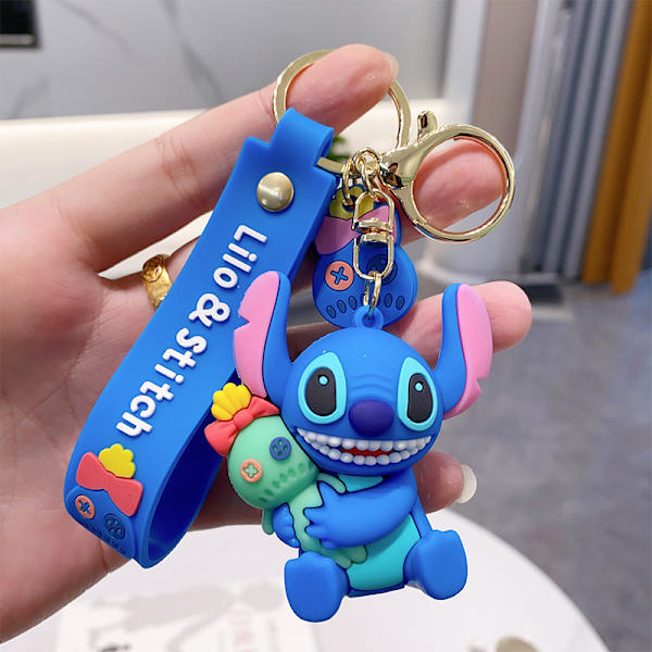 Anime söpö Stitch silikoninen avaimenperä, PVC-riipus avaimenperä renkaan pidike rannekoru tarvikkeet lapsille lahjat（Akin Stevie-sivuhalaus）