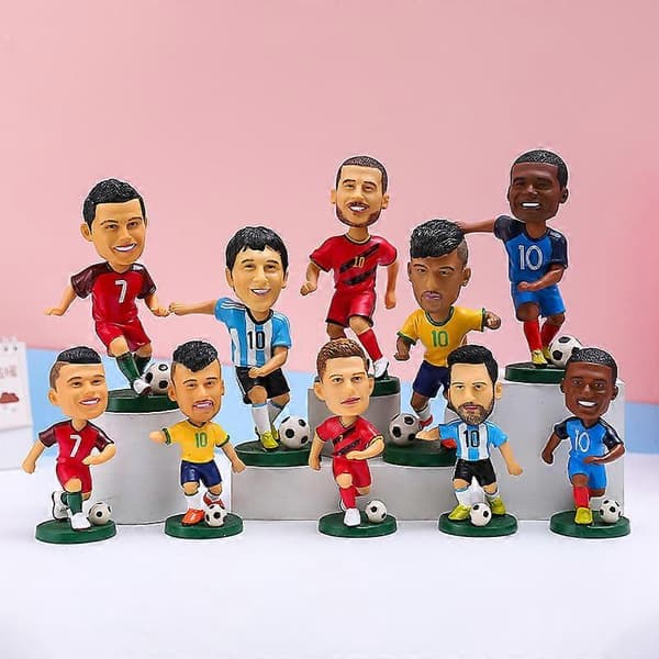 Qatari fotbollsstjärna handdocka bobblehead hartsfigur kråka