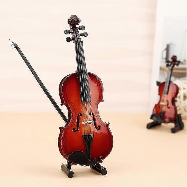 Verdens mindste spilbare violin, med udsøgte håndlavede detaljer, er den perfekte gave til musikelskere.