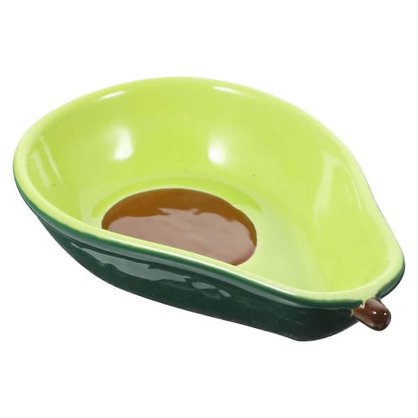 Avokadoformet keramikkskål, egnet for snacks og mat.