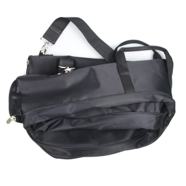 Sammenleggbar golfreisebag i nylon med skulderstropper og kompakt oppbevaring