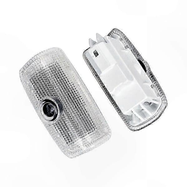 Fyra LED-dörrprojektorer, kompatibla med Infinitis välkomstbelysningssystem.
