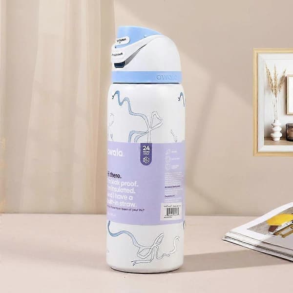 Owala 946 ml (32 oz) vattenflaska med marinblå rosett, FreeSip