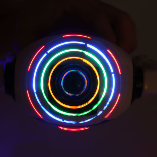 Dansende humanoid robotleke med 360° roterende lys - Gave til barn