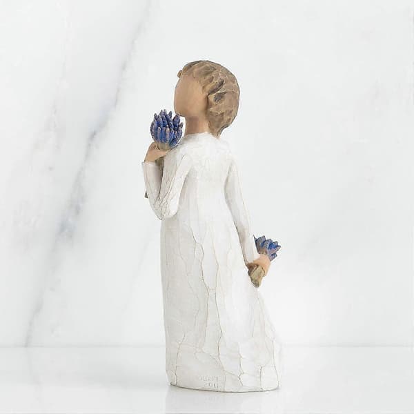 En elegant liten figur av et piletre og lavendel