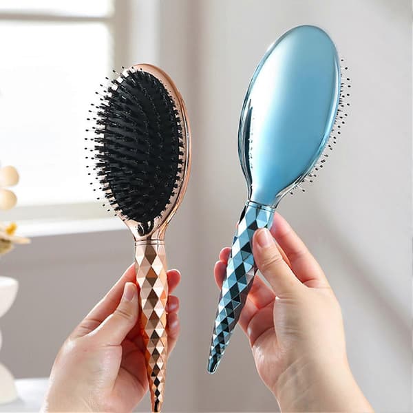 Våd og tør paddlebørste - ventileret design - velegnet til føntørring og styling.