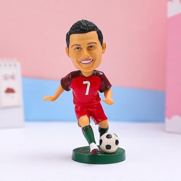 Qatari fotbollsstjärna handdocka bobblehead hartsfigur kråka