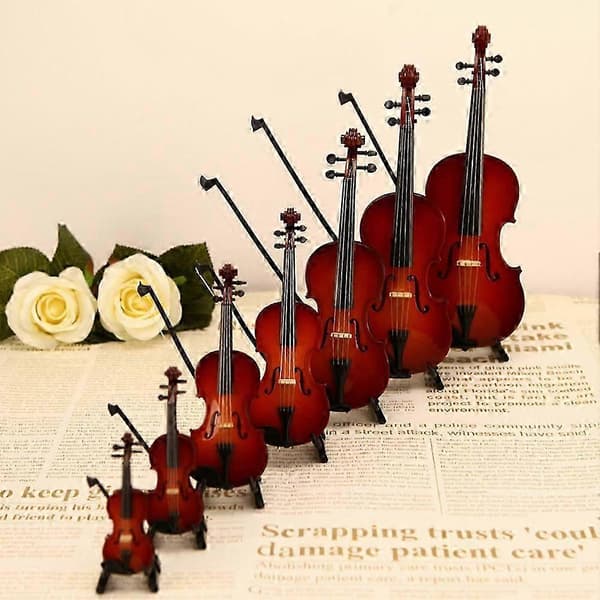 Verdens mindste spilbare violin, med udsøgte håndlavede detaljer, er den perfekte gave til musikelskere.