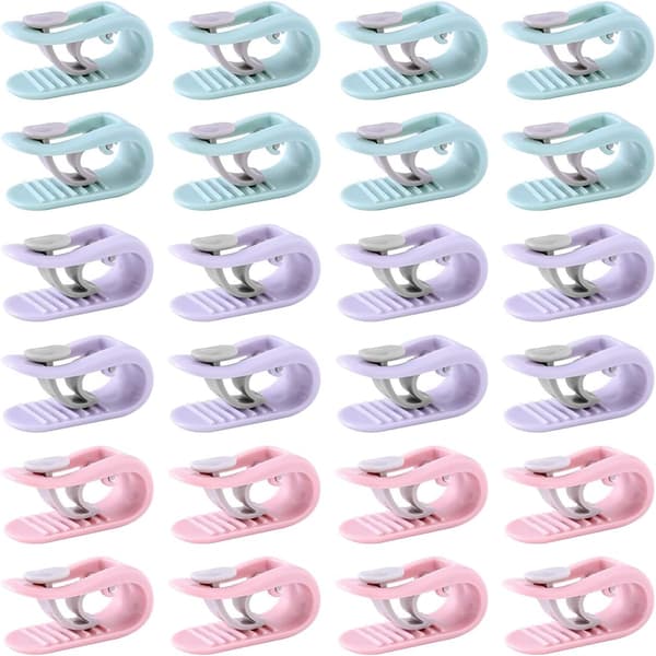 24 teppeklemmer (blå, rosa, lilla), svært elastiske