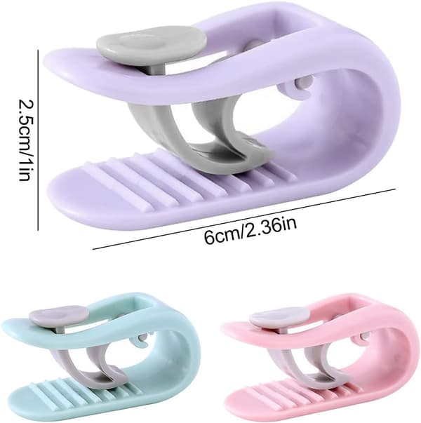 24 teppeklemmer (blå, rosa, lilla), svært elastiske