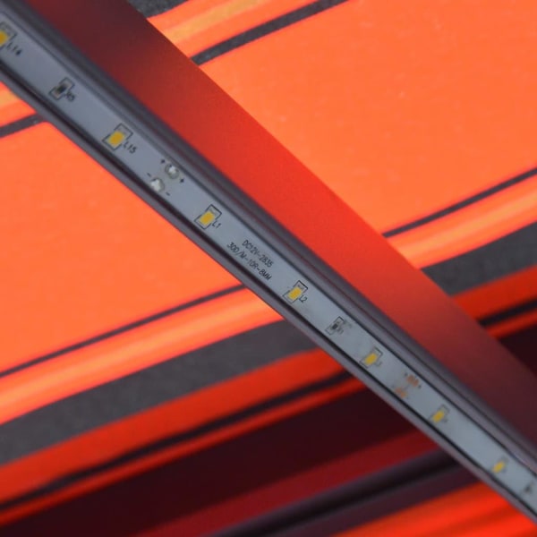 vidaXL Markis manuellt infällbar med LED 400x300 cm orange och b Orange