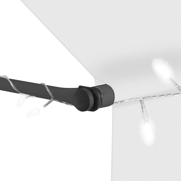 vidaXL Markis manuellt infällbar med LED 150 cm gräddvit Creme
