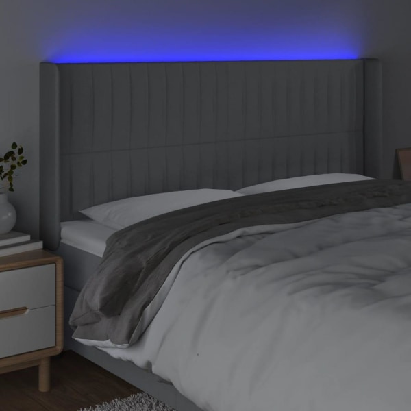 vidaXL Sänggavel LED ljusgrå 203x16x118/128 cm tyg Grå