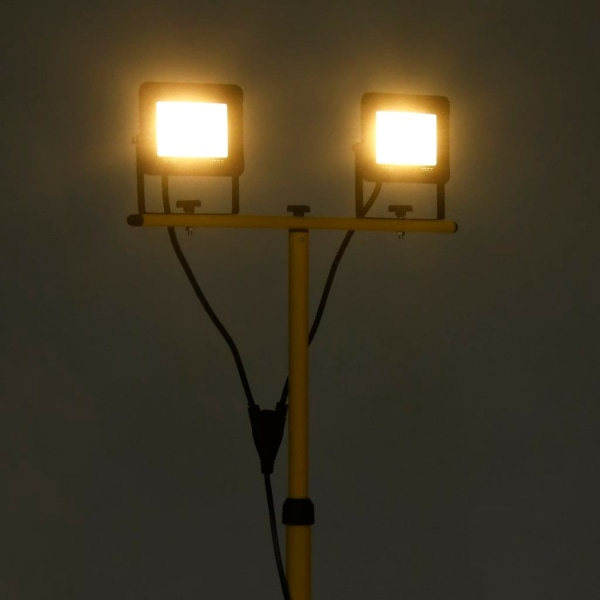 vidaXL Strålkastare med stativ 2x30 W LED varmvit Svart
