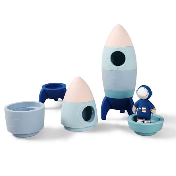 Liten pojke monterar pussel tidig utbildning spel stor partikel silikon raket matryoshka leksak astronaut