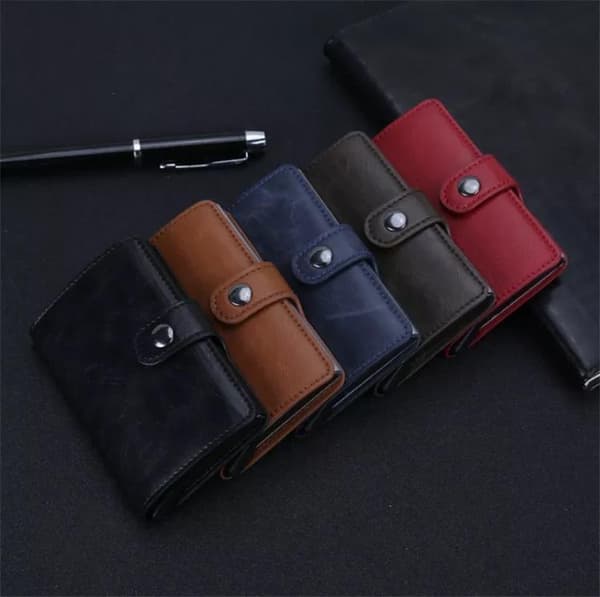 RFID-protected card holder with ejector and button Light brown brown