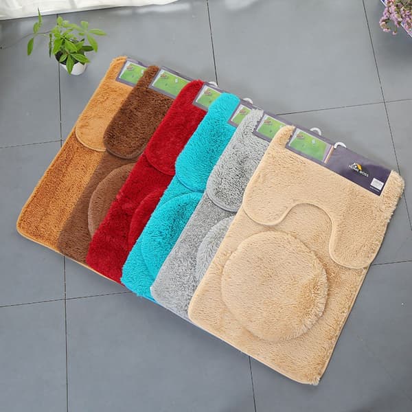 Bathroom Decor Set Includes Light Blue U-Shaped Floor Mat, Carpet, and Toilet Seat with Rubber Backing.