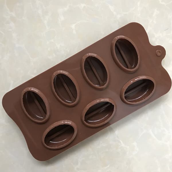 silikonform med 7 kaffebönor, perfekt för att baka kakor.
