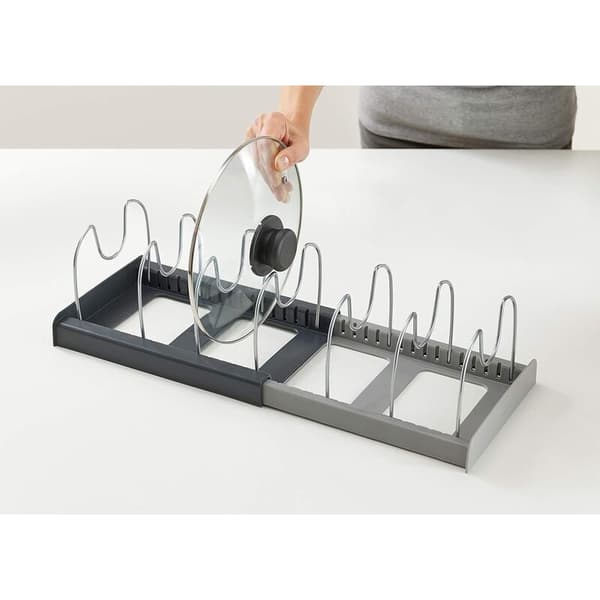 This pot rack/trimmer/kitchen storage rack has 7 adjustable compartments and is perfect for storing kitchen utensils, frying pans, pot lids, and more.